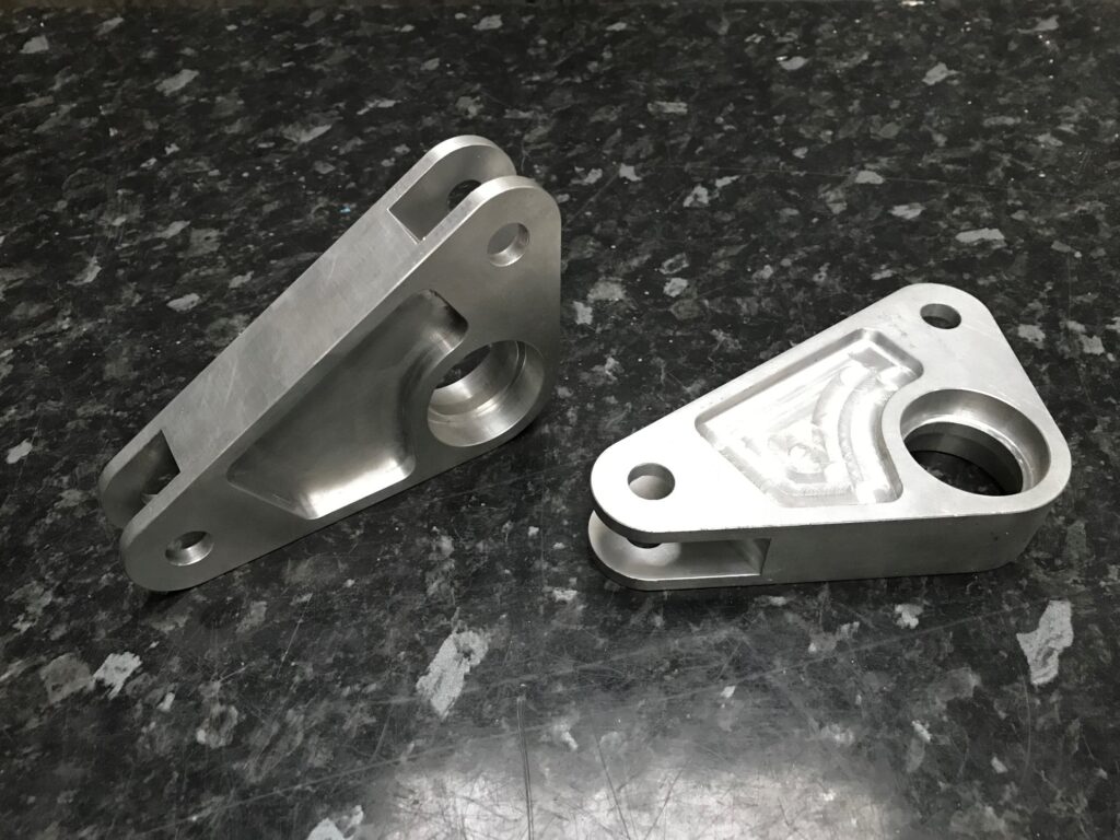 CNC machined race car suspension rockers