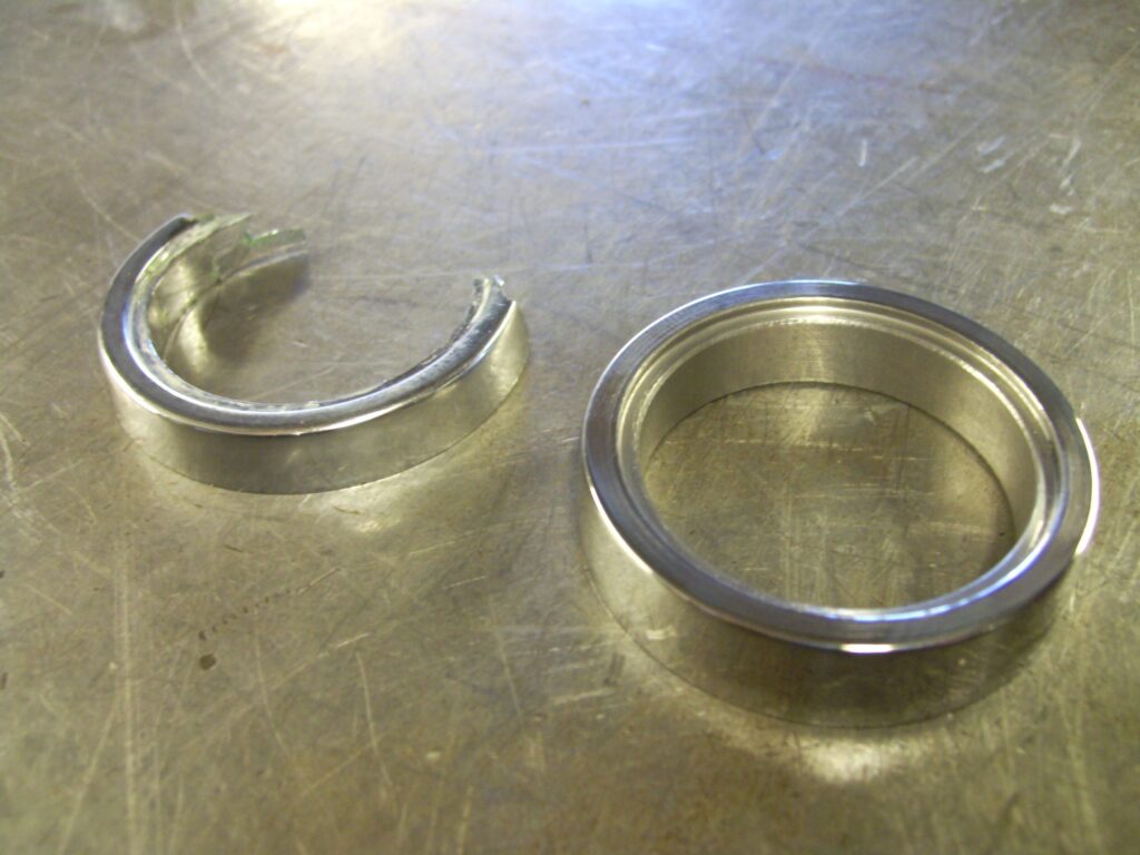 Re-manufactured plastic ring in stainless steel